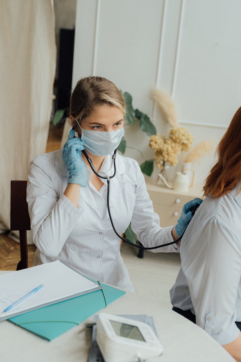 Doctor Checking the Back of a Patient, medicare